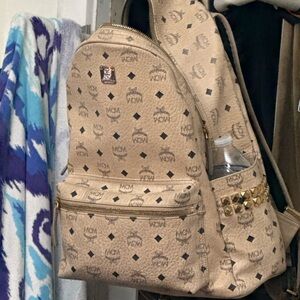MCM Tan Monogram Backpack with Gold Accents
